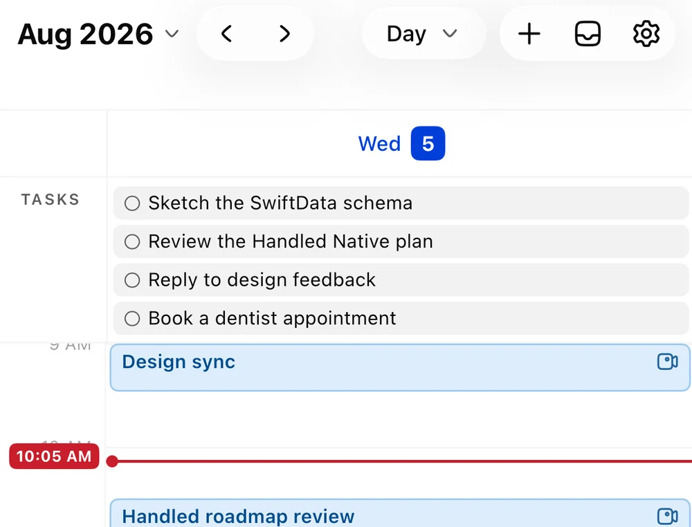 Handled's day view: tasks pinned above the grid, meetings below, and a now-line across the current time